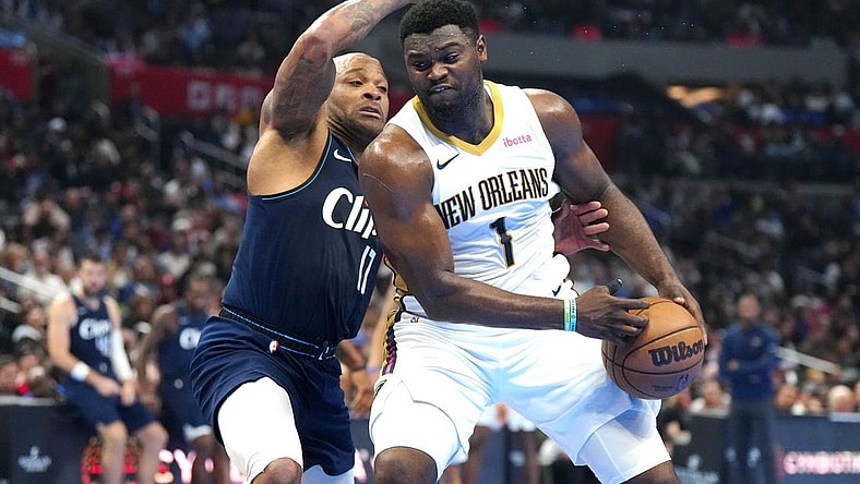 Nov 24, 2023; Los Angeles, California, USA; New Orleans Pelicans forward Zion Williamson (1) moves to the basket against LA Clippers forward P.J. Tucker (17) in the first half at Crypto.com Arena. Mandatory Credit: Kirby Lee-USA TODAY Sports