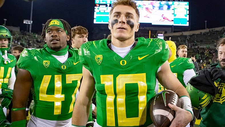 Oregon quarterback Bo Nix walks off the field after the the No. 6 Oregon Ducks defeated the No. 16 Oregon State Beavers Friday, Nov. 24, 2023, at Autzen Stadium in Eugene, Ore.