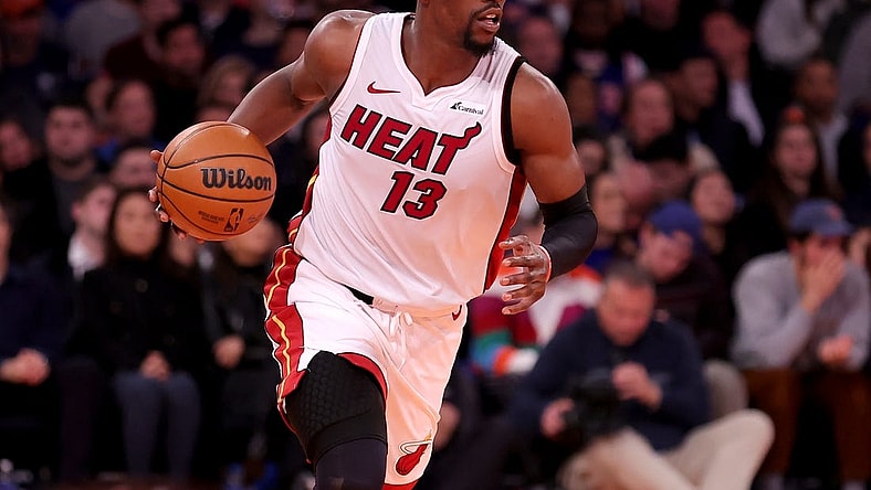 Nov 24, 2023; New York, New York, USA; Miami Heat center Bam Adebayo (13) brings the ball up court against the New York Knicks during the first quarter at Madison Square Garden. Mandatory Credit: Brad Penner-USA TODAY Sports