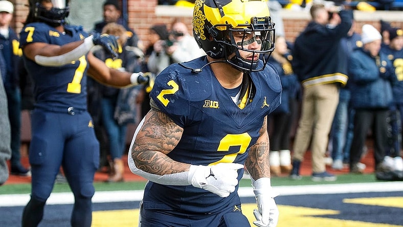 Michigan running back Blake Corum warms up before the Ohio State game at Michigan Stadium in Ann Arbor on Saturday, Nov. 25, 2023.