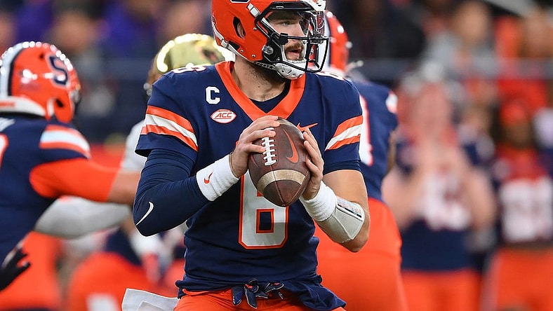 Nov 25, 2023; Syracuse, New York, USA; Syracuse Orange quarterback Garrett Schrader (6) drops back to pass against the Wake Forest Demon Deacons during the first half at the JMA Wireless Dome. Mandatory Credit: Rich Barnes-USA TODAY Sports