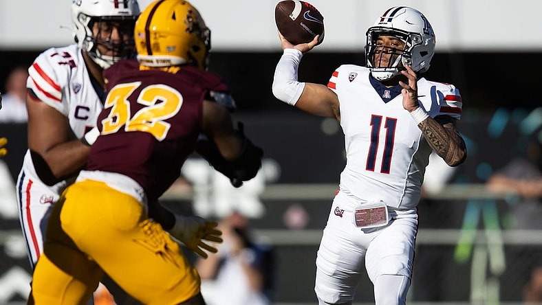 Nov 25, 2023; Tempe, Arizona, USA; Arizona Wildcats quarterback Noah Fifita (11) against the Arizona State Sun Devils in the first half of the Territorial Cup at Mountain America Stadium. Mandatory Credit: Mark J. Rebilas-USA TODAY Sports
