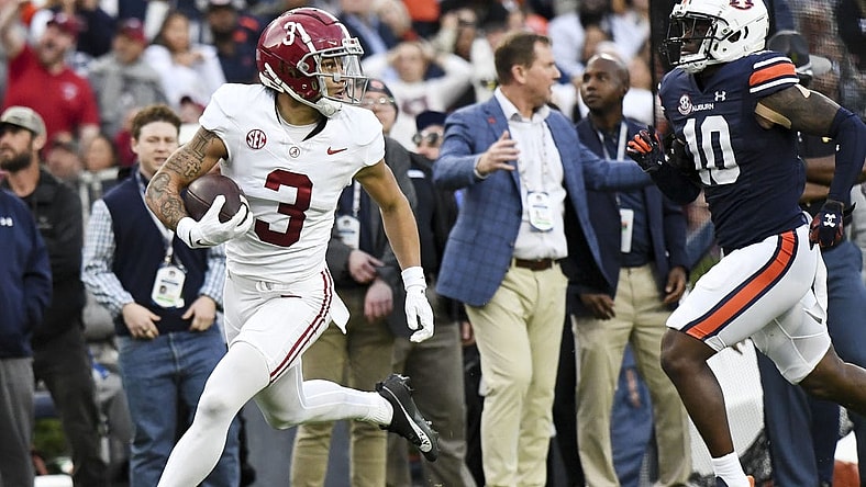 Nov 25, 2023; Auburn, Alabama, USA;  Alabama Crimson Tide wide receiver Jermaine Burton (3) runs against Auburn Tigers safety Zion Puckett (10) for a touchdown at Jordan-Hare Stadium. Mandatory Credit: Gary Cosby Jr.-USA TODAY Sports