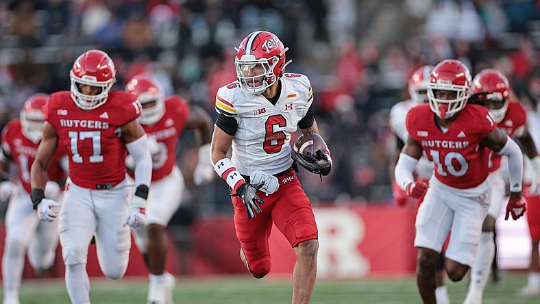 Nov 25, 2023; Piscataway, New Jersey, USA; Maryland Terrapins wide receiver Jeshaun Jones (6) gains yards after a catch during the first half as Rutgers Scarlet Knights linebacker Deion Jennings (17) and defensive back Flip Dixon (10) pursues at SHI Stadium. Mandatory Credit: Vincent Carchietta-USA TODAY Sports