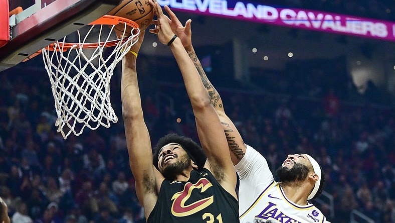 Nov 25, 2023; Cleveland, Ohio, USA; Cleveland Cavaliers center Jarrett Allen (31) drives to the basket against Los Angeles Lakers forward Anthony Davis (3) during the first half at Rocket Mortgage FieldHouse. Mandatory Credit: Ken Blaze-USA TODAY Sports