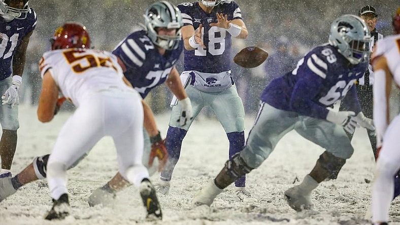 Nov 25, 2023; Manhattan, Kansas, USA; Kansas State Wildcats quarterback Will Howard (18) takes the snap during the second quarter against the Iowa State Cyclones at Bill Snyder Family Football Stadium. Mandatory Credit: Scott Sewell-USA TODAY Sports