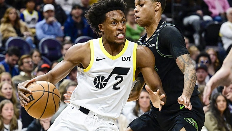 Nov 25, 2023; Salt Lake City, Utah, USA; Utah Jazz guard Collin Sexton (2) dribbles the ball against New Orleans Pelicans guard Jordan Hawkins (24) during the first half at Delta Center. Mandatory Credit: Christopher Creveling-USA TODAY Sports