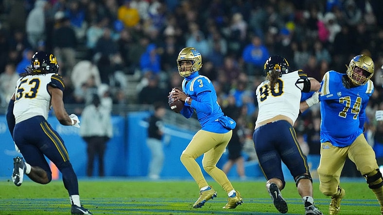 Nov 25, 2023; Pasadena, California, USA; UCLA Bruins quarterback Dante Moore (3) throws the ball against the California Golden Bears in the first half at Rose Bowl. Mandatory Credit: Kirby Lee-USA TODAY Sports