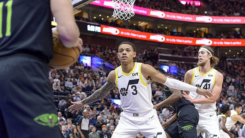 Nov 25, 2023; Salt Lake City, Utah, USA; New Orleans Pelicans guard Dyson Daniels (11) passes the ball from the baseline against Utah Jazz guard Keyonte George (3) during the second half at Delta Center. Mandatory Credit: Christopher Creveling-USA TODAY Sports