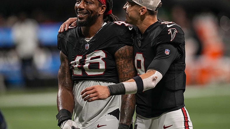 Nov 26, 2023; Atlanta, Georgia, USA; Atlanta Falcons linebacker Bud Dupree (48) and quarterback Desmond Ridder (9) react after defeating the New Orleans Saints at Mercedes-Benz Stadium. Mandatory Credit: Dale Zanine-USA TODAY Sports