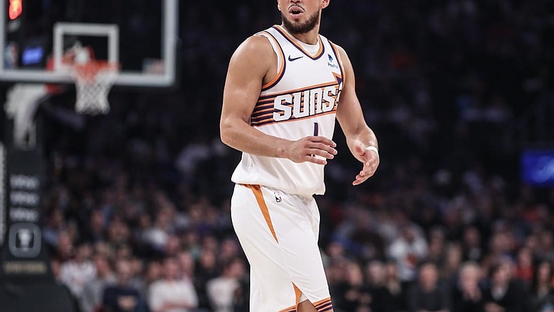 Nov 26, 2023; New York, New York, USA; Phoenix Suns guard Devin Booker (1) argues over a call in the first quarter against the New York Knicks at Madison Square Garden. Mandatory Credit: Wendell Cruz-USA TODAY Sports