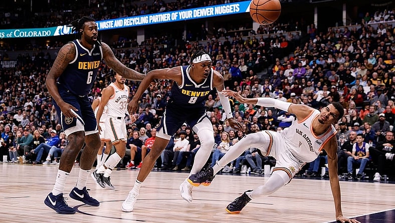 Nov 26, 2023; Denver, Colorado, USA; Denver Nuggets center DeAndre Jordan (6) and forward Peyton Watson (8) and San Antonio Spurs center Victor Wembanyama (1) watch for a loose ball in the second quarter at Ball Arena. Mandatory Credit: Isaiah J. Downing-USA TODAY Sports