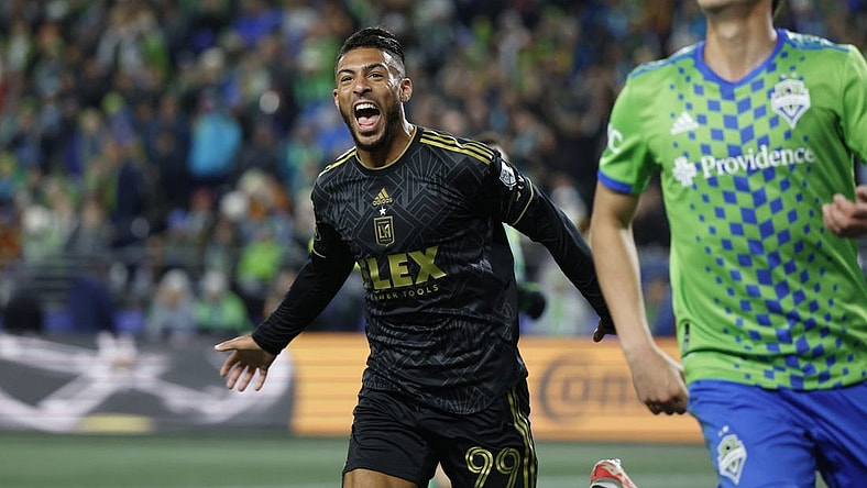 Nov 26, 2023; Seattle, Washington, USA; Los Angeles FC forward Denis Bouanga (99) reacts after scoring during the first half of a MLS Cup Western Conference Semifinal match against the Seattle Sounders at Lumen Field. Mandatory Credit: Joe Nicholson-USA TODAY Sports