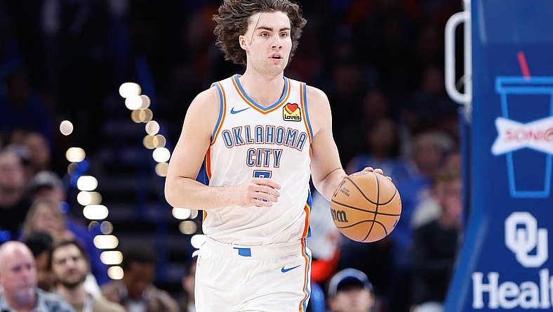 Nov 25, 2023; Oklahoma City, Oklahoma, USA; Oklahoma City Thunder guard Josh Giddey (3) dribbles the ball up the court against the Philadelphia 76ers during the second half at Paycom Center. Mandatory Credit: Alonzo Adams-USA TODAY Sports