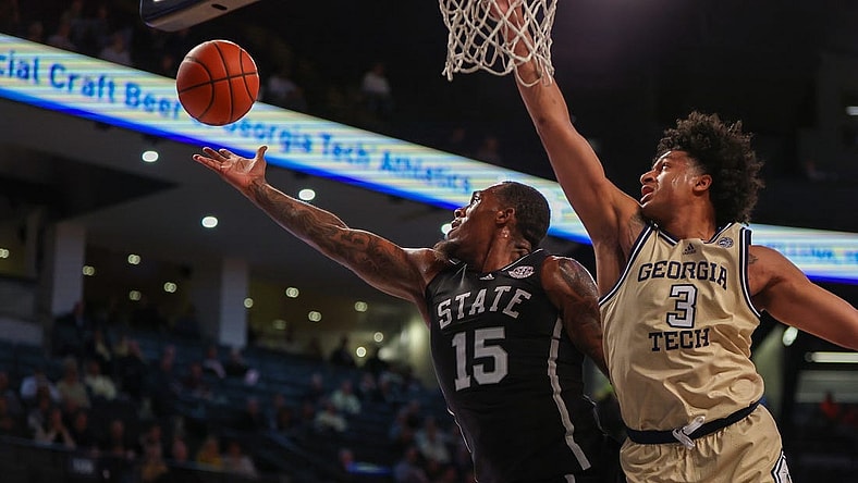 Nov 28, 2023; Atlanta, Georgia, USA; Mississippi State Bulldogs forward Jimmy Bell Jr. (15) grabs a rebound past Georgia Tech Yellow Jackets guard Dallan Coleman (3) in the first half at McCamish Pavilion. Mandatory Credit: Brett Davis-USA TODAY Sports