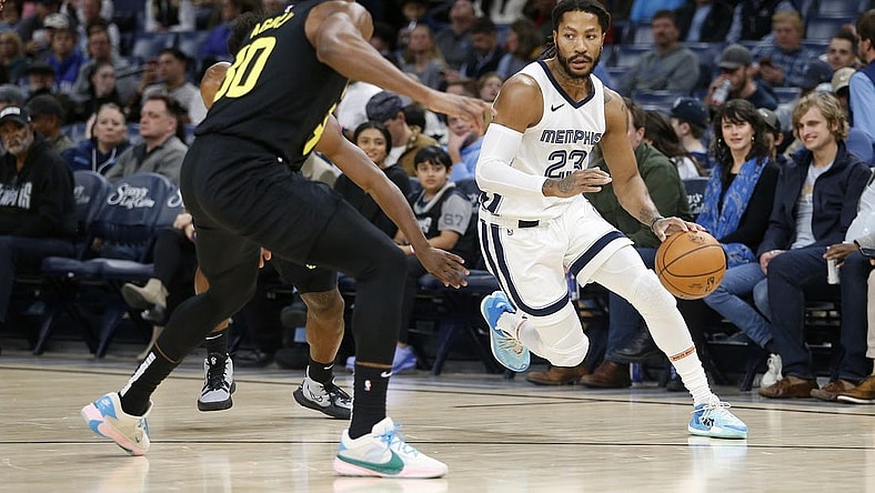 Nov 29, 2023; Memphis, Tennessee, USA; Memphis Grizzlies guard Derrick Rose (23) drives to the basket during the first half against the Utah Jazz at FedExForum. Mandatory Credit: Petre Thomas-USA TODAY Sports