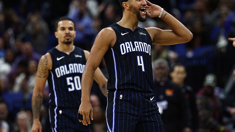 Nov 29, 2023; Orlando, Florida, USA; Orlando Magic guards Jalen Suggs (4) and Cole Anthony (50) celebrate after a basket against the Washington Wizards during the second half at Amway Center. Mandatory Credit: Kim Klement Neitzel-USA TODAY Sports