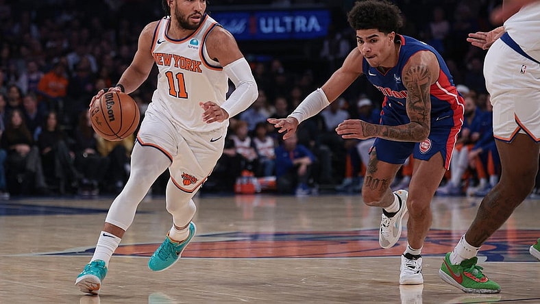 Nov 30, 2023; New York, New York, USA; New York Knicks guard Jalen Brunson (11) dribbles as Detroit Pistons guard Killian Hayes (7) defends during the first half at Madison Square Garden. Mandatory Credit: Vincent Carchietta-USA TODAY Sports