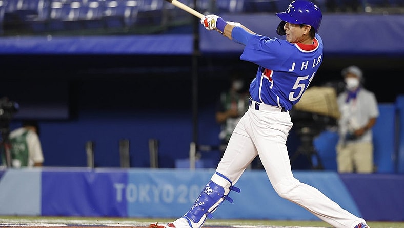 Jul 31, 2021; Yokohama, Japan; Team South Korea outfielder Jung Hoo Lee (51) hits a single against USA during the Tokyo 2020 Olympic Summer Games at Yokohama Baseball Stadium. Mandatory Credit: Yukihito Taguchi-USA TODAY Sports