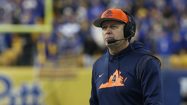 Nov 20, 2021; Pittsburgh, Pennsylvania, USA;  Virginia Cavaliers head coach Bronco Mendenhall looks on from the sidelines against the Pittsburgh Panthers during the second quarter at Heinz Field. Mandatory Credit: Charles LeClaire-USA TODAY Sports