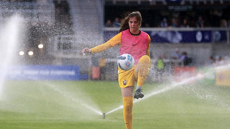Jun 11, 2022; Louisville, Kentucky, USA;  Angel City FC goalkeeper Maia Perez (24) warms up during half time as the sprinkler system runs against Racing Louisville FC at Lynn Family Stadium. Mandatory Credit: EM Dash-USA TODAY Sports