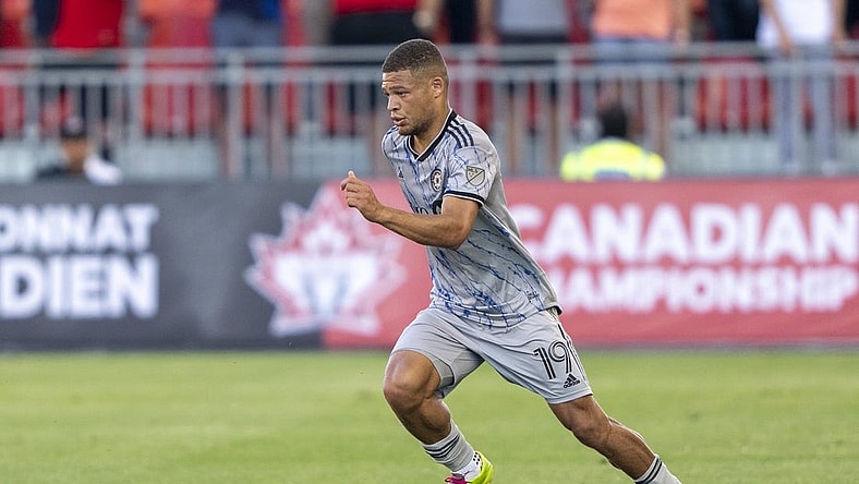 Jun 22, 2022; Toronto, Ontario, USA; CF Montreal defender Zorhan Bassong (19) moves the ball against Toronto FC at BMO Field Mandatory Credit: Kevin Sousa-USA TODAY Sports