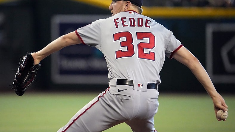 Jul 24, 2022; Phoenix, Arizona, USA; Washington Nationals starting pitcher Erick Fedde (32) pitches against the Arizona Diamondbacks during the first inning at Chase Field. Mandatory Credit: Joe Camporeale-USA TODAY Sports