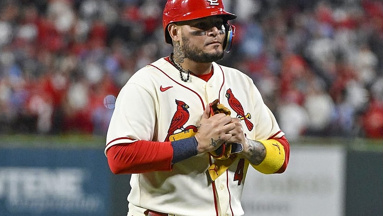Oct 8, 2022; St. Louis, Missouri, USA; St. Louis Cardinals catcher Yadier Molina (4) walks off the field after hitting a single for his final postseason at bat in the ninth inning against the Philadelphia Phillies during game two of the Wild Card series for the 2022 MLB Playoffs at Busch Stadium. Mandatory Credit: Jeff Curry-USA TODAY Sports