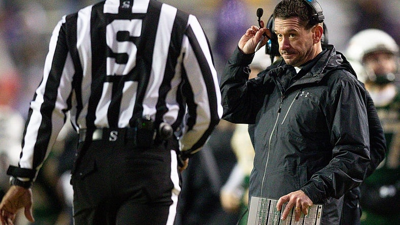 Nov 19, 2022; Baton Rouge, Louisiana, USA;  UAB Blazers interim head coach Bryant Vincent  talks to the side judge against the LSU Tigers during the second half at Tiger Stadium. Mandatory Credit: Stephen Lew-USA TODAY Sports