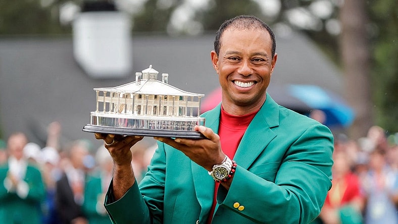 Tiger Woods celebrates during the trophy presentation after winning the Masters Tournament at Augusta National Golf Club, Sunday, April 14, 2019, in Augusta, Georgia. [ALLEN EYESTONE/FOR THE AUGUSTA CHRONICLE]