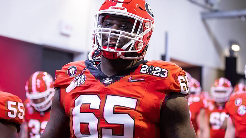 Jan 9, 2023; Inglewood, CA, USA; Georgia Bulldogs offensive lineman Amarius Mims (65) against the TCU Horned Frogs during the CFP national championship game at SoFi Stadium. Mandatory Credit: Mark J. Rebilas-USA TODAY Sports