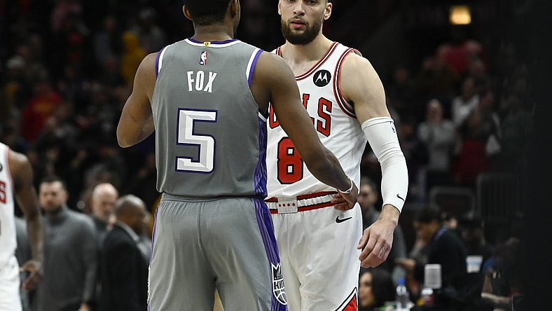 Mar 15, 2023; Chicago, Illinois, USA; Sacramento Kings guard De'Aaron Fox (5) and Chicago Bulls guard Zach LaVine (8) talk after the game at the United Center. Mandatory Credit: Matt Marton-USA TODAY Sports