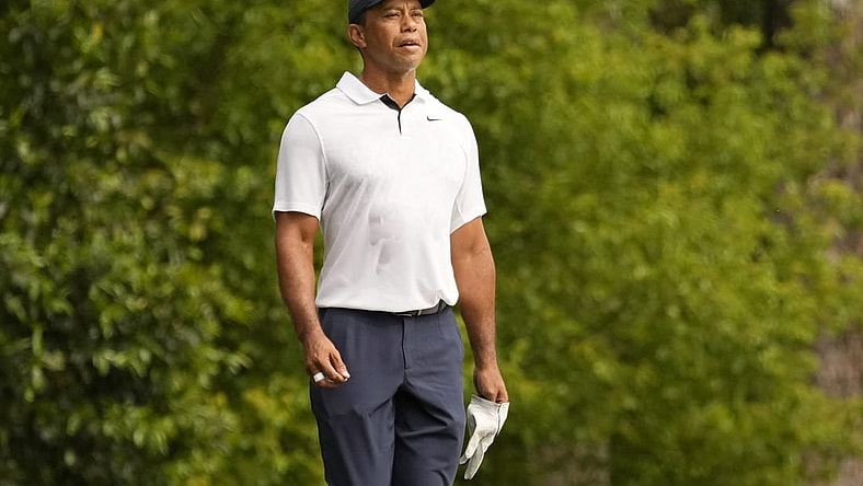 Apr 6, 2023; Augusta, Georgia, USA; Tiger Woods watches his shot on the second fairway during the first round of The Masters golf tournament. Mandatory Credit: Michael Madrid-USA TODAY Network