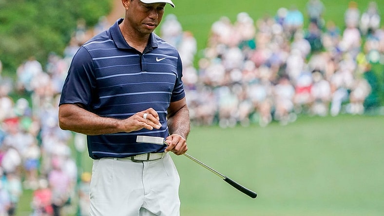 April 7: Tiger Woods reacts to his putt on the sixth green during the second round of the Masters.

Pga Masters Tournament Second Round