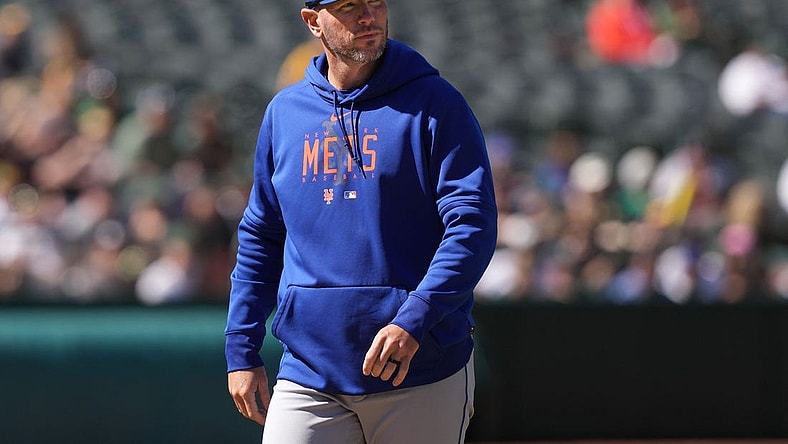 Apr 16, 2023; Oakland, California, USA; New York Mets pitching coach Jeremy Hefner walks to the dugout during the eighth inning against the Oakland Athletics at RingCentral Coliseum. Mandatory Credit: Darren Yamashita-USA TODAY Sports