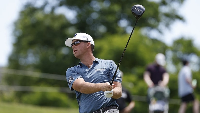May 27, 2023; Potomac Falls, Virginia, USA; Andy Ogletree hits his tee shot on the second hole during the second round of LIV Golf Washington, D.C. golf tournament at Trump National. Mandatory Credit: Geoff Burke-USA TODAY Sports