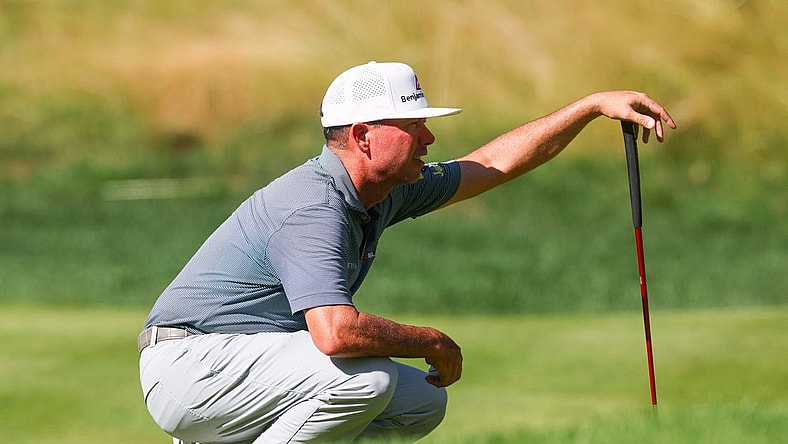 Jun 25, 2023; Cromwell, Connecticut, USA; Chez Reavie reads his putt on the 14th green during the final round of the Travelers Championship golf tournament. Mandatory Credit: Vincent Carchietta-USA TODAY Sports
