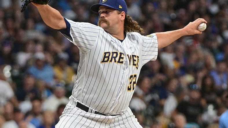 Aug 5, 2023; Milwaukee, Wisconsin, USA;  Milwaukee Brewers pitcher Andrew Chafin (32) pitches against the Pittsburgh Pirates in the eighth inning at American Family Field. Mandatory Credit: Benny Sieu-USA TODAY Sports