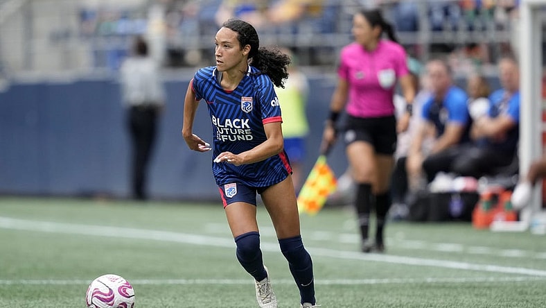 Aug 6, 2023; Seattle, WA, USA; OL Reign defender Alyssa Malonson (20) controls the ball during the second half against Portland Thorns FC  at Lumen Field. Mandatory Credit: Stephen Brashear-USA TODAY Sports