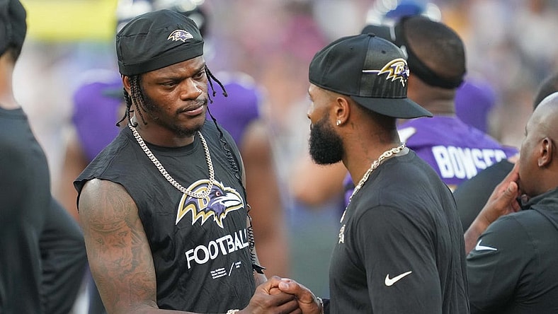 Aug 12, 2023; Baltimore, Maryland, USA; Baltimore Ravens quarterback Lamar Jackson (left) greets wide receiver  Odell Beckham Jr (right) on the sideline during the first quarter against the Philadelphia Eagles at M&T Bank Stadium. Mandatory Credit: Mitch Stringer-USA TODAY Sports
