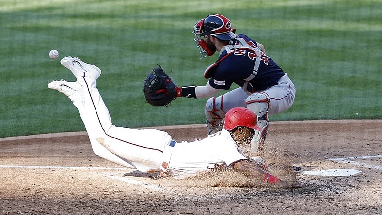 Aug 17, 2023; Washington, District of Columbia, USA; Washington Nationals second baseman Jeter Downs (3) scores a run ahead of a tag by Boston Red Sox catcher Connor Wong (12) on a two run double by Nationals designated hitter Joey Meneses (not pictured) during the fifth inning at Nationals Park. Mandatory Credit: Geoff Burke-USA TODAY Sports