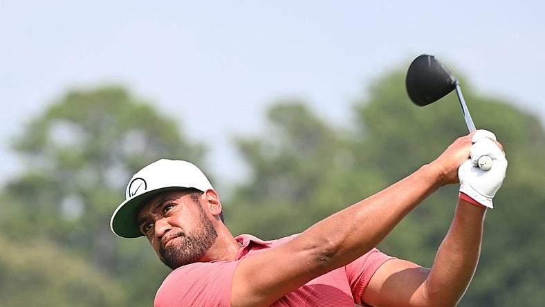 Aug 24, 2023; Atlanta, Georgia, USA; Tony Finau tees off on the 16th hole during the first round of the TOUR Championship golf tournament at East Lake Golf Club. Mandatory Credit: Adam Hagy-USA TODAY Sports