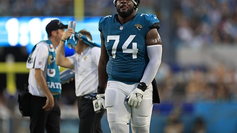 Jacksonville Jaguars offensive tackle Cam Robinson (74) reacts to a catch being confirmed in favor of the Jacksonville Jaguars during the second quarter of a preseason matchup Saturday, Aug. 26, 2023 at EverBank Stadium in Jacksonville, Fla. [Corey Perrine/Florida Times-Union]