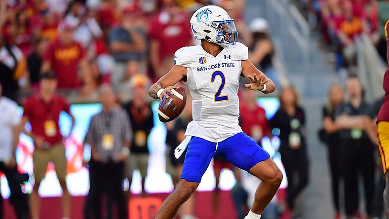 Aug 26, 2023; Los Angeles, California, USA; San Jose State Spartans quarterback Chevan Cordeiro (2) drops back to pass against the Southern California Trojans during the first half at Los Angeles Memorial Coliseum. Mandatory Credit: Gary A. Vasquez-USA TODAY Sports