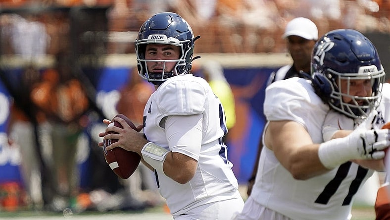 Sep 2, 2023; Austin, Texas, USA; Rice Owls quarterback JT Daniels (18) looks to pass during the first half against the Texas Longhorns at Darrell K Royal-Texas Memorial Stadium. Mandatory Credit: Scott Wachter-USA TODAY Sports