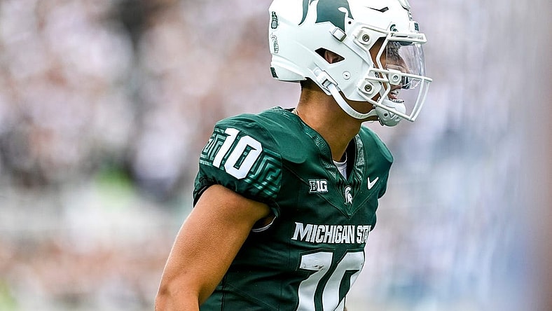 Michigan State's Noah Kim heads to the sideline after throwing a touchdown against Richmond during the second quarter on Saturday, Sept. 9, 2023, at Spartan Stadium in East Lansing.