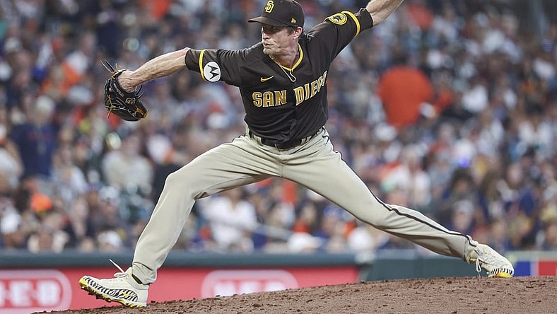 Sep 10, 2023; Houston, Texas, USA; San Diego Padres relief pitcher Tim Hill (25) delivers a pitch during the sixth inning against the Houston Astros at Minute Maid Park. Mandatory Credit: Troy Taormina-USA TODAY Sports