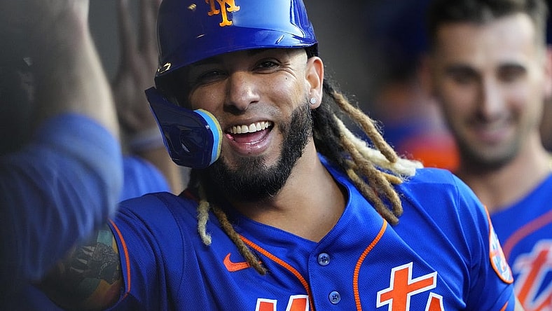 Sep 14, 2023; New York City, New York, USA; New York Mets third baseman Jonathan Arauz (19) is congratulated by teammate for hitting a three run home run against the Arizona Diamondbacks during the eighth inning at Citi Field. Mandatory Credit: Gregory Fisher-USA TODAY Sports