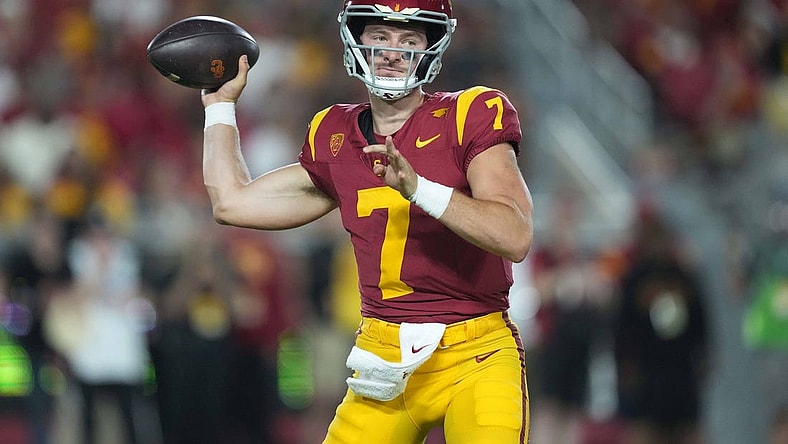 Sep 9, 2023; Los Angeles, California, USA; Southern California Trojans quarterback Miller Moss (7) throws the ball against the Stanford Cardinal in the second half at United Airlines Field at Los Angeles Memorial Coliseum. Mandatory Credit: Kirby Lee-USA TODAY Sports