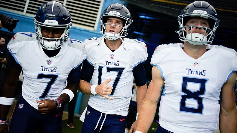 Sep 17, 2023; Nashville, Tennessee, USA; Tennessee Titans quarterbacks Malik Willis (7), Ryan Tannehill (17) and Will Levis (8) head to the field face the Los Angeles Chargers at Nissan Stadium. Mandatory Credit: Andrew Nelles-USA TODAY Sports